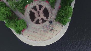 Aerial view pond in park at summer sunny day. Stock. Top view of the city Park on the pond video