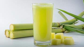 AI generated Fresh squeezed sugar cane juice with sugar cane isolated on white background photo