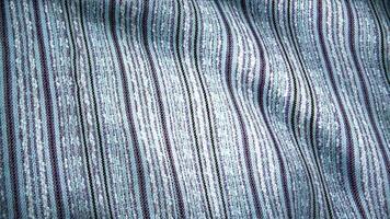 Background texture of soft rippled stripes fabric textile material, seamless looping. Background of colored cloth video