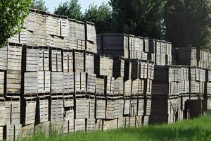 Wooden boxes stacked together photo