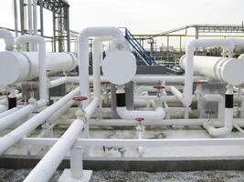 Heat exchangers in a refinery. The equipment for oil refining photo