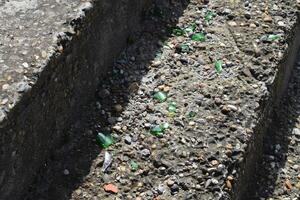 Glass splinters on concrete steps photo