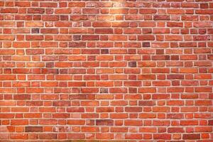 Red brick wall texture grunge background photo