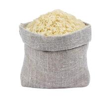 Parboiled rice in burlap bag isolated on white photo