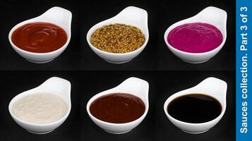 Different sauces isolated on black background photo