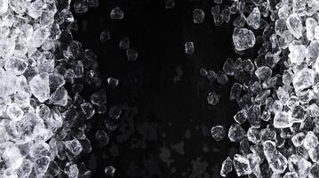 Pieces of crushed ice on black background photo