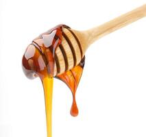 Honey stick isolated on white photo