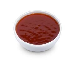 Hot chilli sauce isolated on white background photo