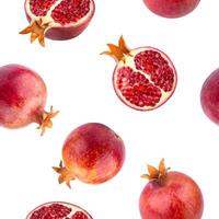 Seamless pattern of pomegranates isolated on white background photo