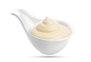 Mayonnaise sauce in bowl isolated on white background with clipping path photo