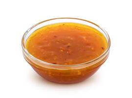 dulce y agrio salsa aislado en blanco antecedentes foto