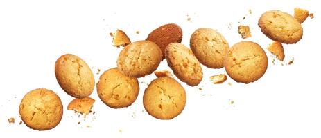 Falling broken chip cookies isolated on white background with clipping path photo