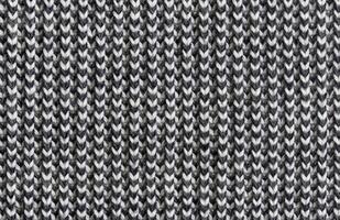Black and white knitted wool texture photo