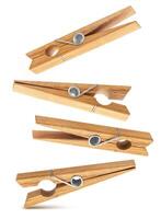 Set of wooden clothespins isolated on white background photo