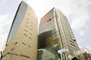 Osaka City, Japan 2023 - NHK building and the Osaka museum of history under bright blue sky background. photo