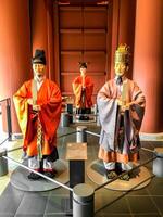 Osaka City, Japan, 2023 - Royal court Japanese dolls wear the ancient clothes standing show in the Osaka NHK building. photo