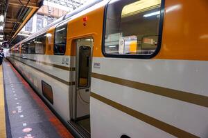 Osaka City, Japan, 2023- Closeup and perspective side of bogie Japan train of VISTA CAR Limited Express from Kyoto to Osaka. Running all the way of Kintetsu line photo