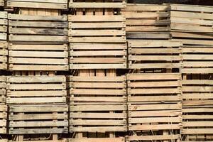 Wooden boxes stacked together. Warehouse empty wooden containers photo