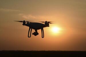 drone silhouette against the background of the sunset photo