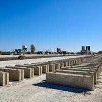 Cinder blocks lie on the ground and dried. on cinder block production plant. photo