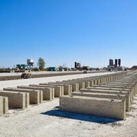 Cinder blocks lie on the ground and dried. on cinder block production plant. photo