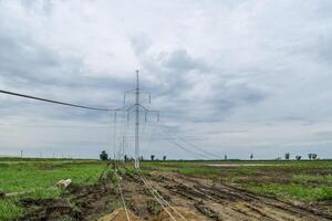 Assembly and installation of new support of a power line photo