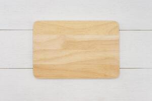 Empty rectangle wooden cutting board. Top view image. photo