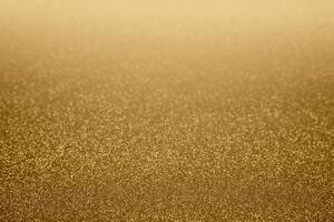 Blurred elegant gold glitter background photo