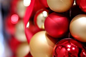 Closeup image of sparkle red and gold Christmas ornaments photo