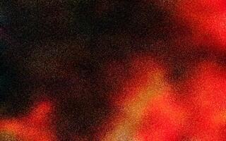 Grainy red, orange, and black colors gradient background with noise or grunge texture effect. Abstract dark grainy color gradient. Grunge texture background. Grainy dark background. Copy space. photo