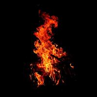 Fire of flame burning isolated on dark background for graphic design purpose photo