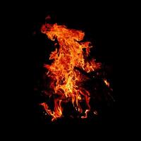 Fire of flame burning isolated on dark background for graphic design purpose photo