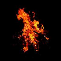 Fire of flame burning isolated on dark background for graphic design purpose photo