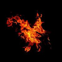 Fire of flame burning isolated on dark background for graphic design purpose photo