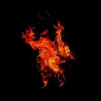 Fire of flame burning isolated on dark background for graphic design purpose photo