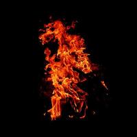 Fire of flame burning isolated on dark background for graphic design purpose photo