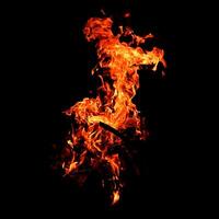 Fire of flame burning isolated on dark background for graphic design purpose photo