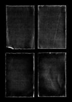 Old Black Empty Aged Damaged Paper Cardboard Photo Card Isolated on Black. Real Halftone Scan. Folded Edges. Rough Grunge Shabby Scratched Torn Ripped Texture. Distressed Overlay Surface