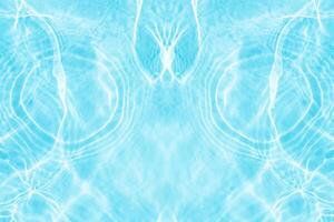 Bluewater waves on the surface ripples blurred. Defocus blurred transparent blue colored clear calm water surface texture with splash and bubbles. Water waves with shining pattern texture background. photo