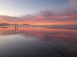 Sunset on Famara Beach on Lanzarote Island photo