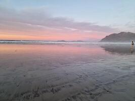 Sunset on Famara Beach on Lanzarote Island photo