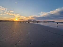 Sunset on Famara Beach on Lanzarote Island photo