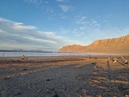 Sunset on Famara Beach on Lanzarote Island photo