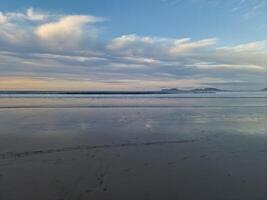 Sunset on Famara Beach on Lanzarote Island photo