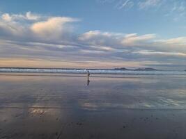 Sunset on Famara Beach on Lanzarote Island photo