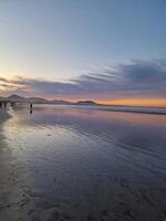 Sunset on Famara Beach on Lanzarote Island photo