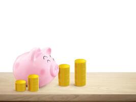 Piggy bank with pile of gold coins on wooden table with white background photo