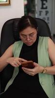 Woman using phone, person of a using smartphone in home, slow motion video