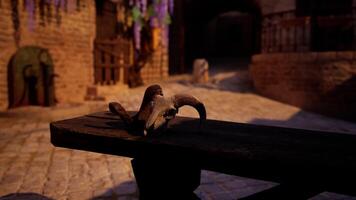 A close up of a wooden bench with a goat's head on it video