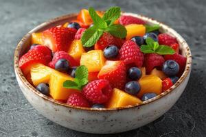 AI generated Fresh mixed fruits salad in a bowl professional advertising food photography photo